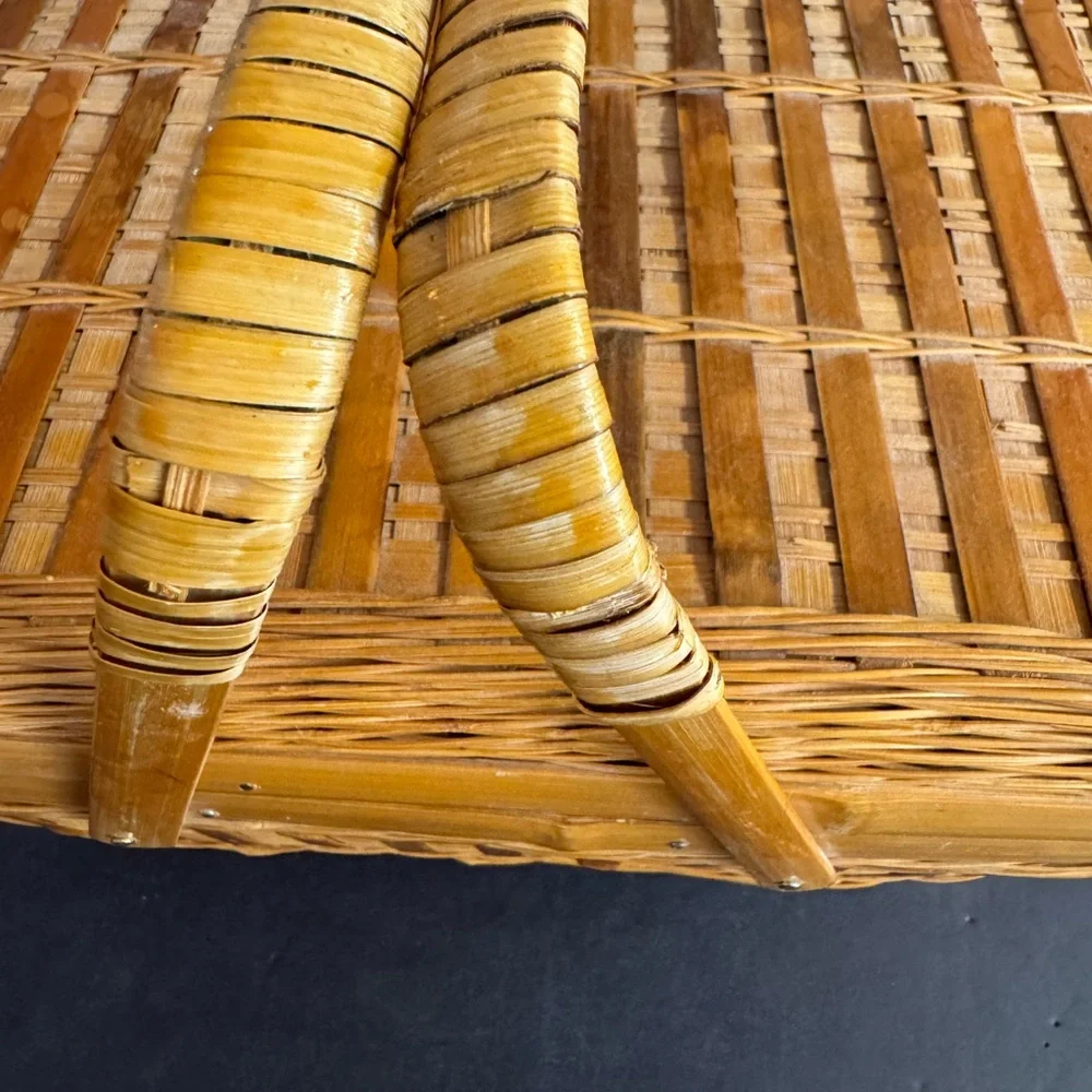 Large Vintage Handmade tan rattan picnic basket with handles.